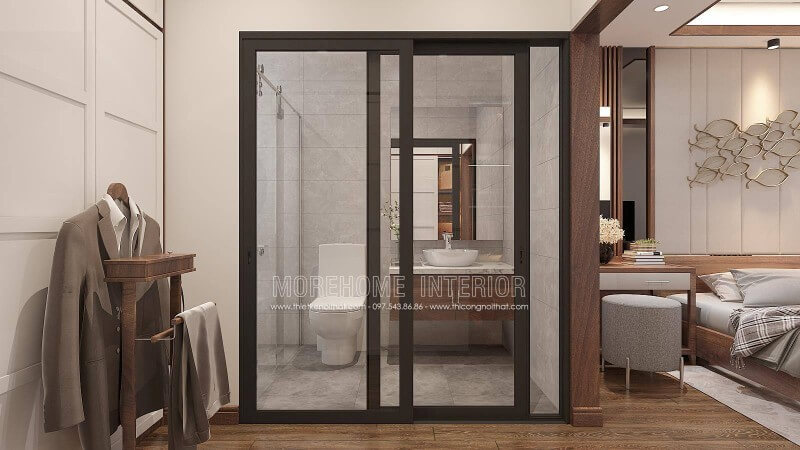 Mẫu trang trí nội thất phòng ngủ hiện đại khép kín trên đây sử dụng tone màu trầm ấn tượng với nội thất gỗ óc chó là một lựa chọn tuyệt vời cho không gian nhà phố, biệt thự.